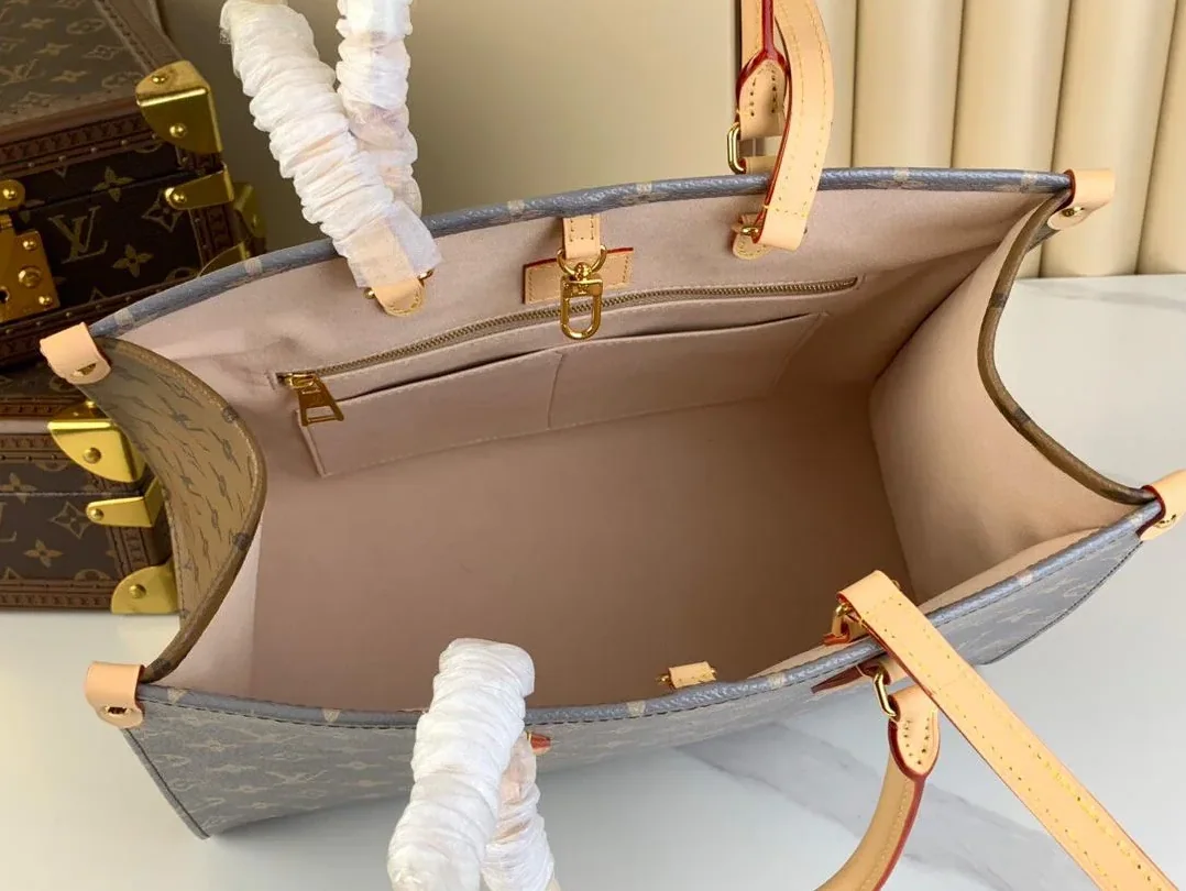 Louis Vuitton Onthego MM Tote Bag in Trianon Grey Gold Hardware