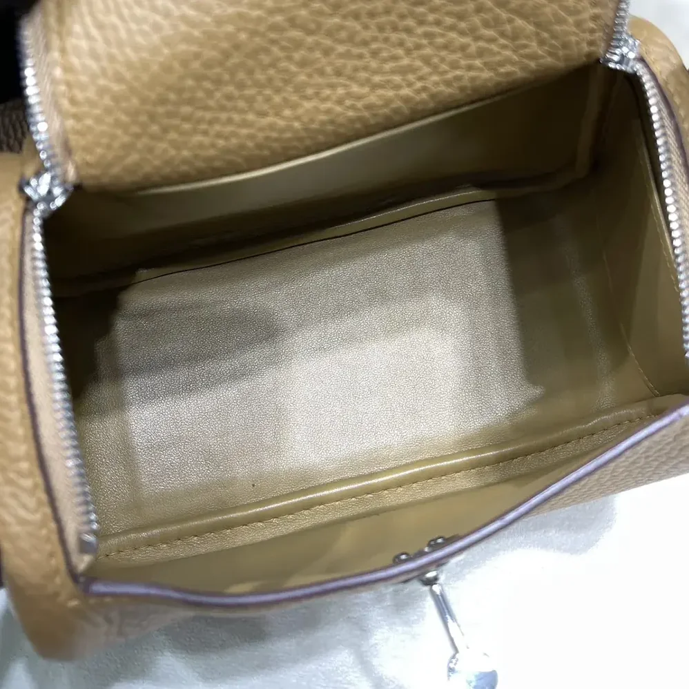 Hermes Lindy Mini 19 in Clemence Leather for Women in Sandy/Silver Hermes Lindy Mini 19 in Clemence Leather for Women in Sandy/Silver