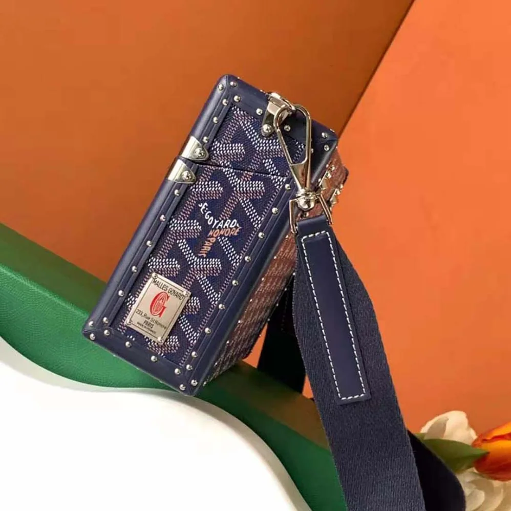 Goyard Cassette Trunk Bag in Goyardine Canvas & Clamecy Cowhide for Women in Navy Goyard Cassette Trunk Bag in Goyardine Canvas & Clamecy Cowhide for Women in Navy