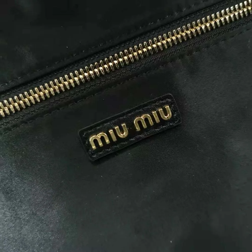 Miu Miu Leather Top-Handle Bag for Women in Black Miu Miu Leather Top-Handle Bag for Women in Black