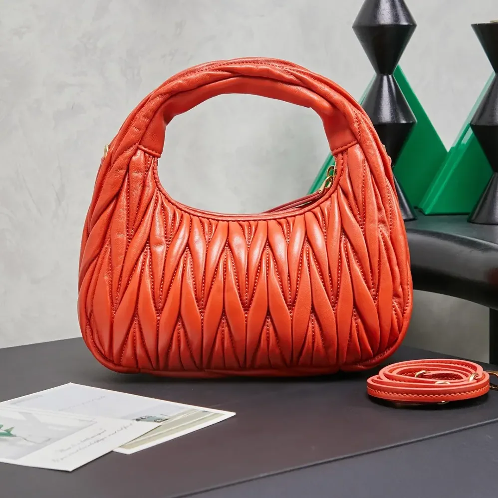 Miu Miu Wander Matelassé Nappa Leather Hobo Bag for Women in Orange Miu Miu Wander Matelassé Nappa Leather Hobo Bag for Women in Orange