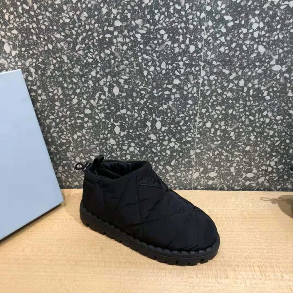 Prada Padded Nylon Slip-on Shoes for Women in Black Prada Padded Nylon Slip-on Shoes for Women in Black