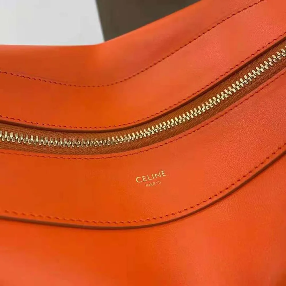 Celine Medium Romy in Supple Calfskin for Women in Orange Celine Medium Romy in Supple Calfskin for Women in Orange