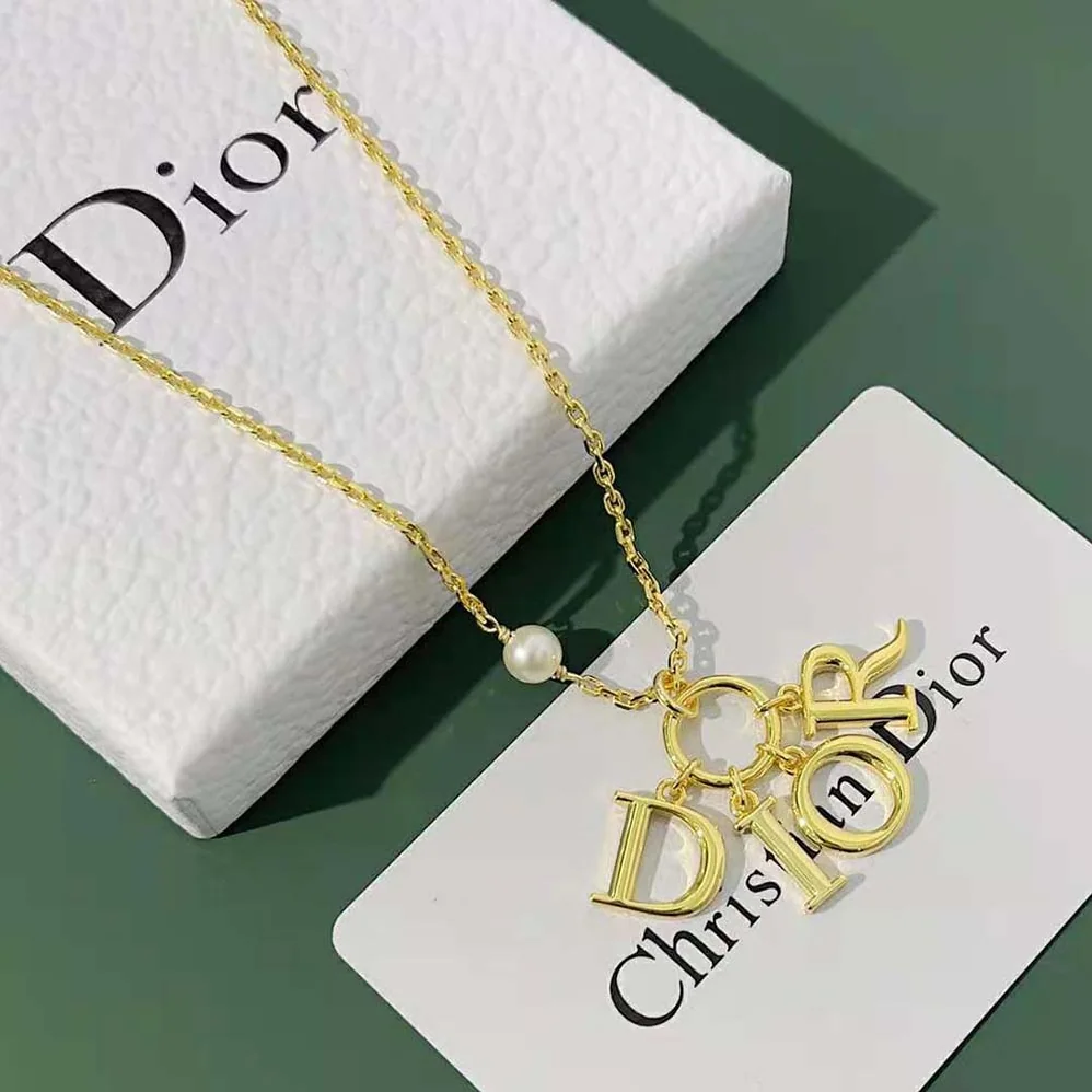 Dior Dio(r)evolution Necklace Gold-Finish Metal with a White Resin Pearl for Women Dior Dio(r)evolution Necklace Gold-Finish Metal with a White Resin Pearl for Women