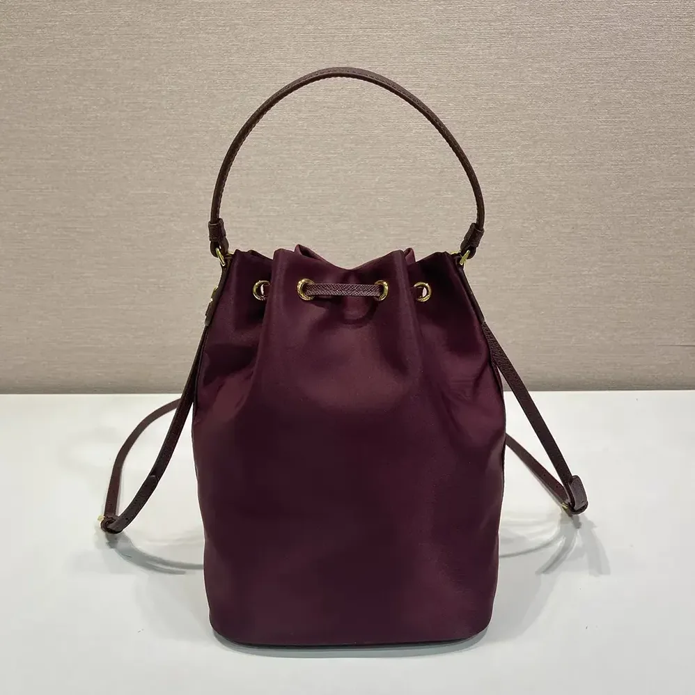 Prada Duet Re-Nylon Bucket Bag for Women in Maroon Prada Duet Re-Nylon Bucket Bag for Women in Maroon