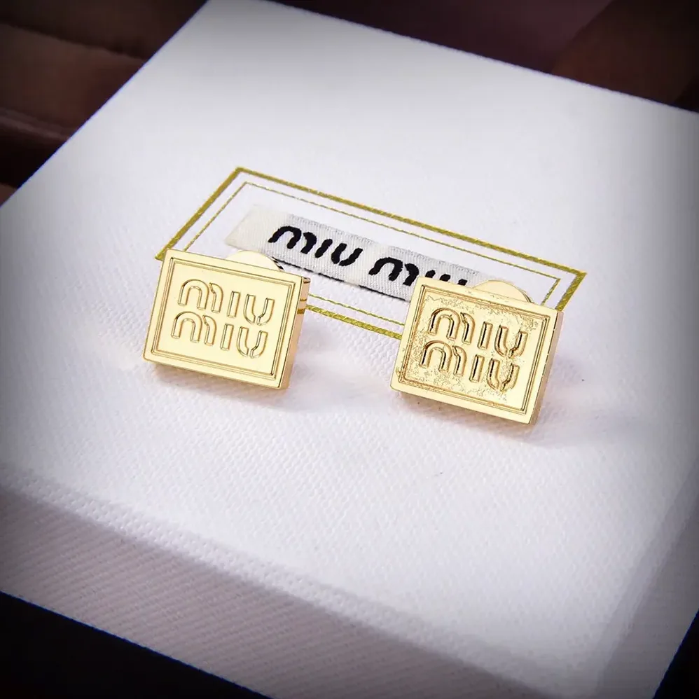 Miu Miu Metal Earrings with Visible Perforated Logo for Women Miu Miu Metal Earrings with Visible Perforated Logo for Women