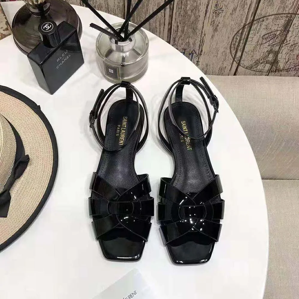 Saint Laurent YSL Tribute Flat Sandals in Patent Leather for Women Saint Laurent YSL Tribute Flat Sandals in Patent Leather for Women