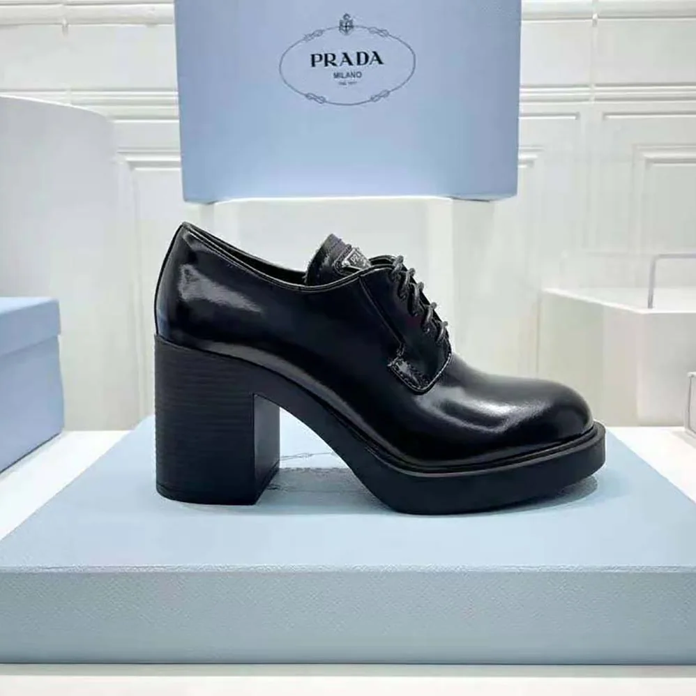 Prada Heeled Brushed Leather Lace-Ups for Women in Black Prada Heeled Brushed Leather Lace-Ups for Women in Black
