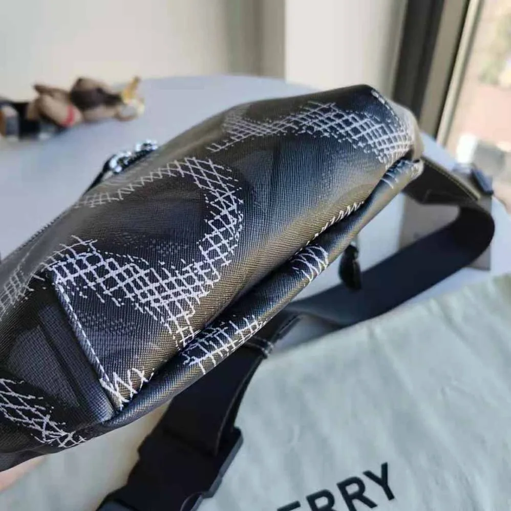 Burberry Monogram Print E-canvas Sonny Bum Bag for Women in Black Burberry Monogram Print E-canvas Sonny Bum Bag for Women in Black