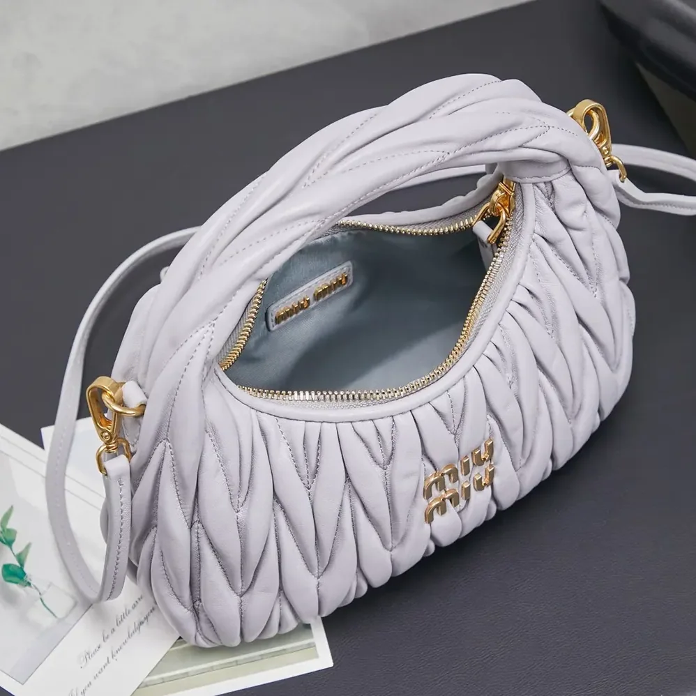 Miu Miu Wander Matelassé Nappa Leather Hobo Bag for Women in Wisteria Miu Miu Wander Matelassé Nappa Leather Hobo Bag for Women in Wisteria