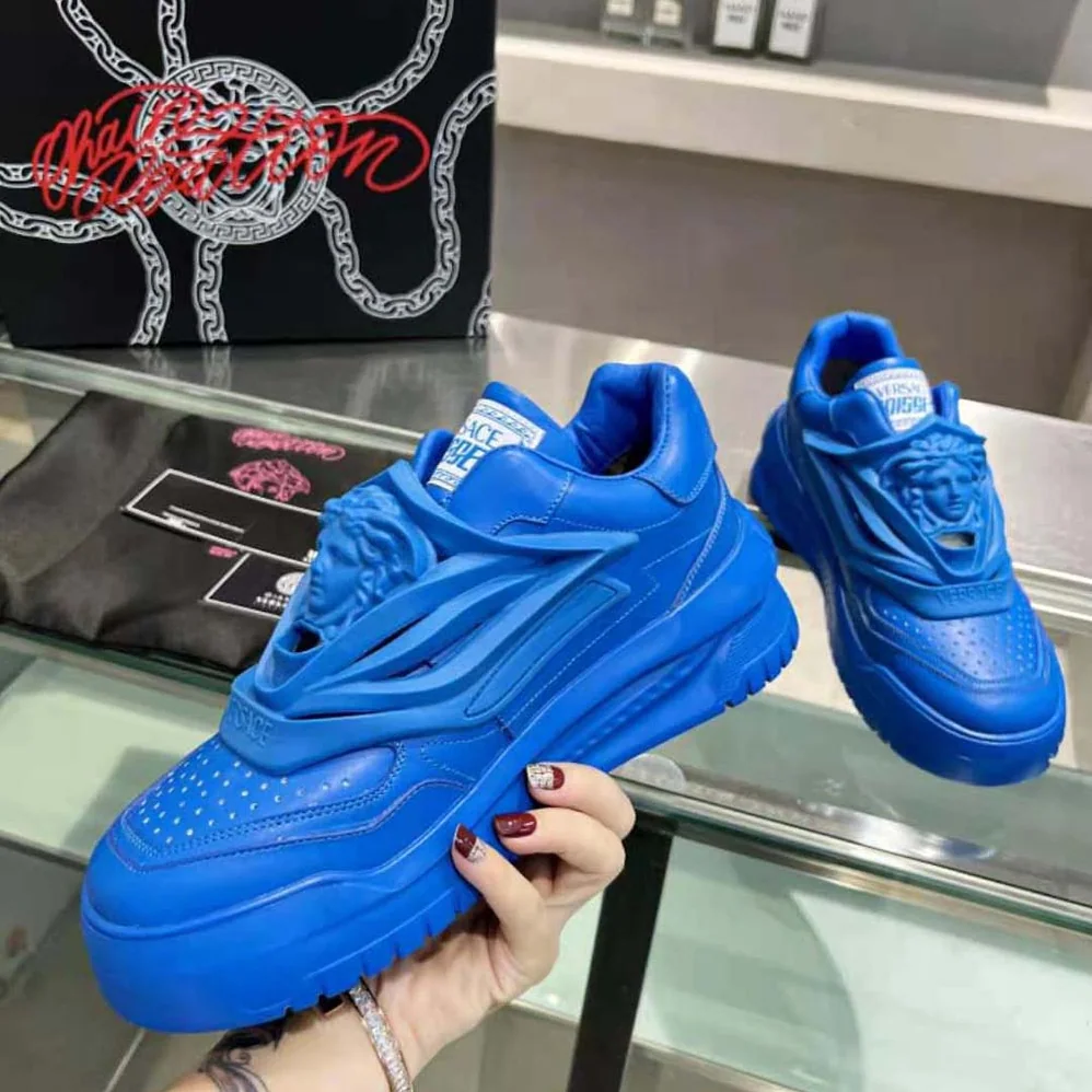 Versace Odissea Sneakers are Set on Rubber Soles with Perforated Toe Caps for Unisex in Blue Versace Odissea Sneakers are Set on Rubber Soles with Perforated Toe Caps for Unisex in Blue