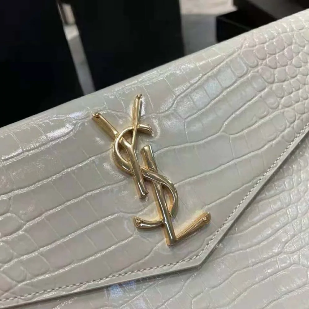 Saint Laurent YSL Uptown Pouch in Crocodile Embossed Shiny Leather for Women in Gold Saint Laurent YSL Uptown Pouch in Crocodile Embossed Shiny Leather for Women in Gold
