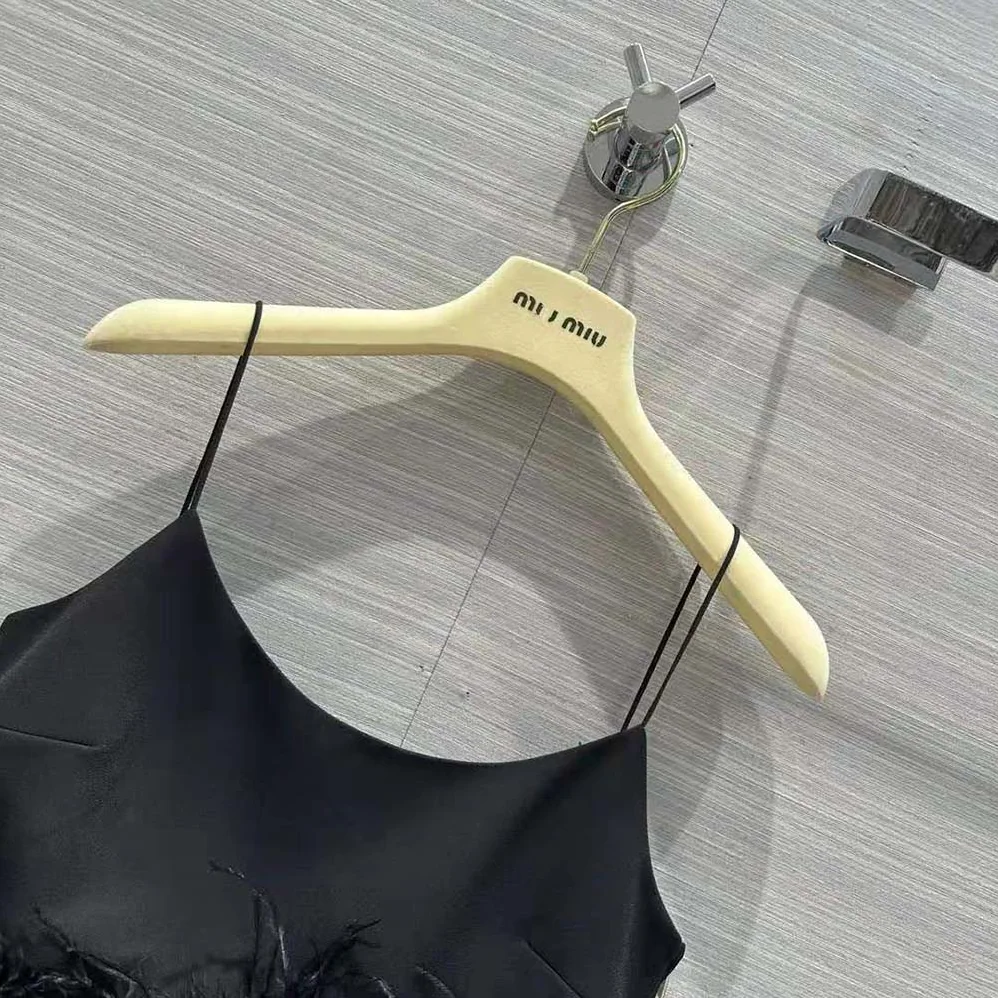 Miu Miu Stretch Cady Top with Feathers for Women in Black Miu Miu Stretch Cady Top with Feathers for Women in Black