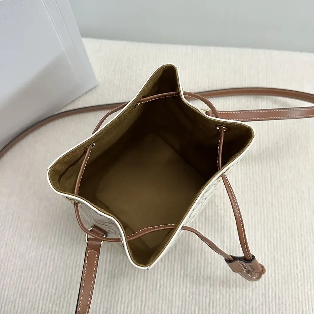 Celine Micro Sailor in Triomphe Canvas and Calfskin for Women in White Celine Micro Sailor in Triomphe Canvas and Calfskin for Women in White