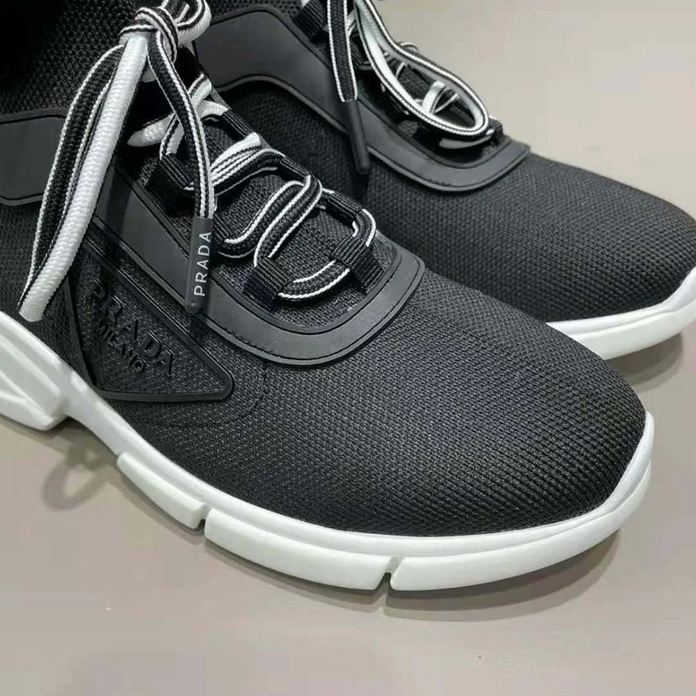 Prada The Triangle Logo Decorates These Knit Fabric Sneakers for Women in Black
