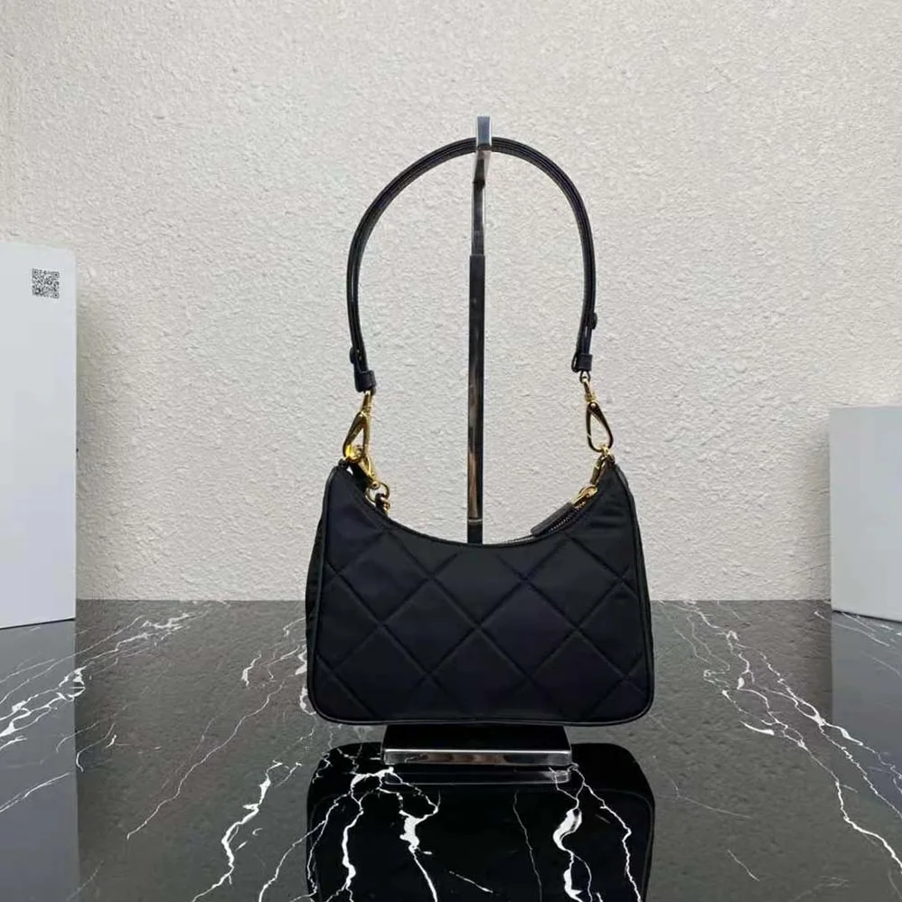 Prada Prada Re-Edition 1995 Chaîne Re-Nylon mini-bag for Women in Black