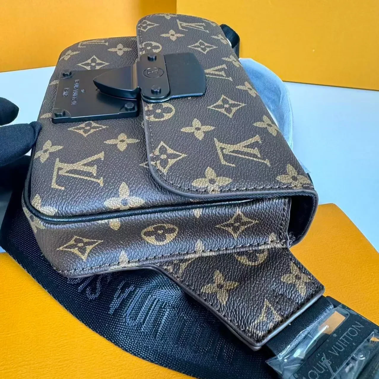 Louis Vuitton S-Lock Sling Monogram Macassar Black Louis Vuitton S-Lock Sling Monogram Macassar Black