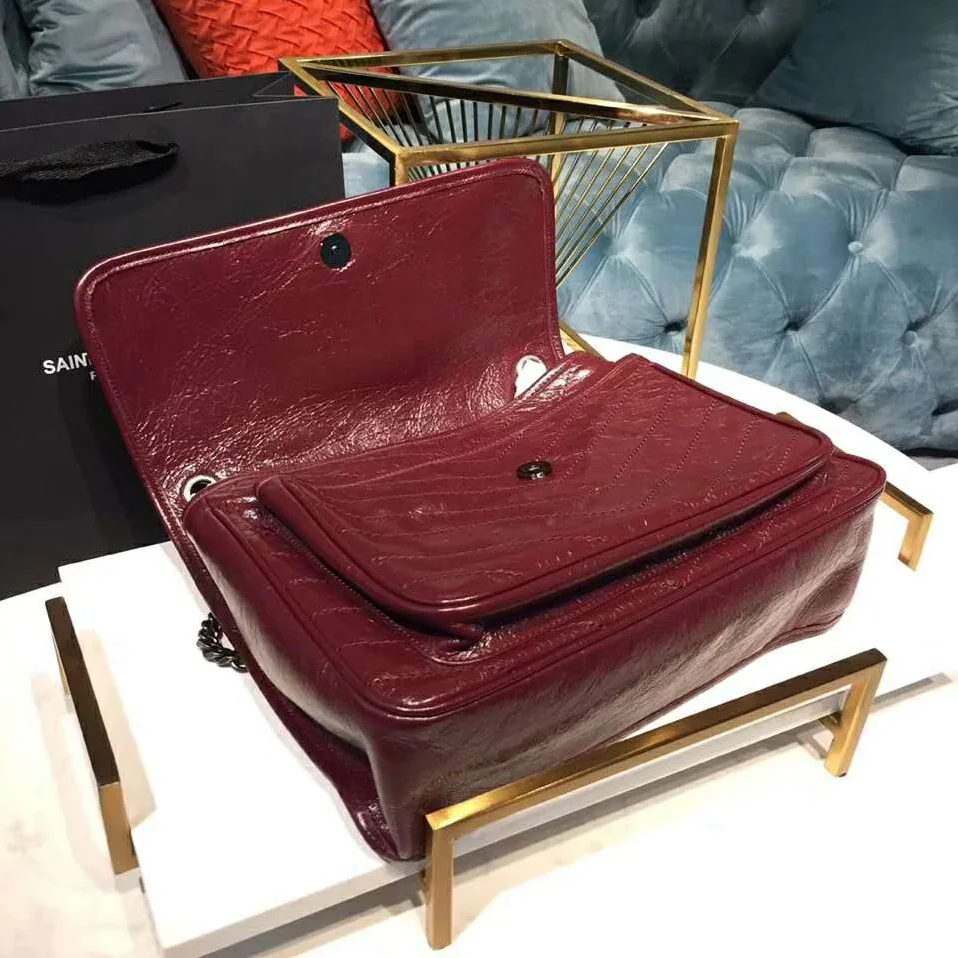 Saint Laurent YSL Niki Large in Vintage Leather for Women in Maroon Saint Laurent YSL Niki Large in Vintage Leather for Women in Maroon