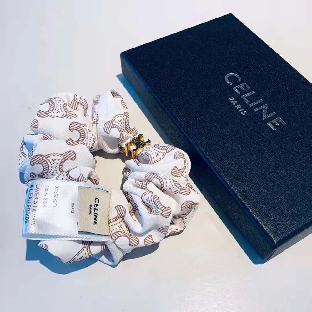 Celine Scrunchy Celine Triomphe Monogram Bracelet in Brass with Gold Finish and White Silk for Women Celine Scrunchy Celine Triomphe Monogram Bracelet in Brass with Gold Finish and White Silk for Women