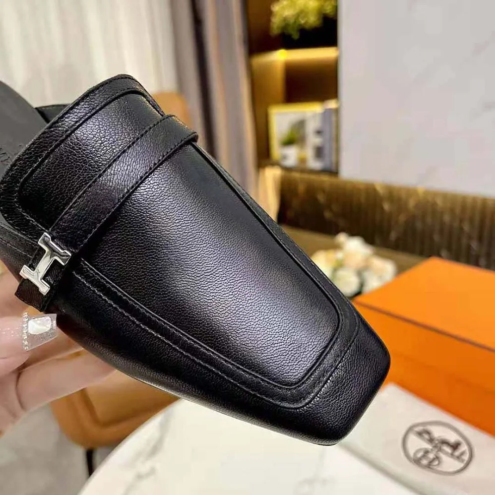 Hermes Groupie Mule in Goatskin with Miniature Palladium-Plated Paris Buckle for Women in Black