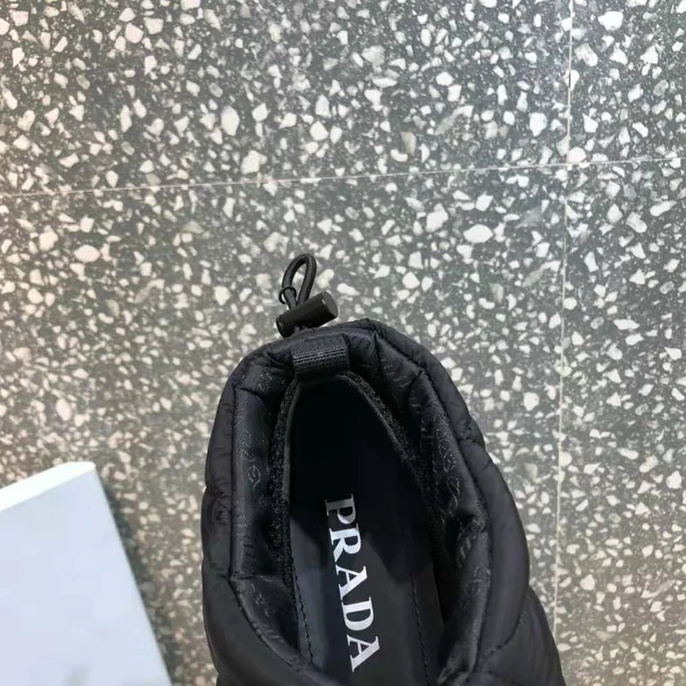 Prada Padded Nylon Slip-on Shoes for Women in Black Prada Padded Nylon Slip-on Shoes for Women in Black