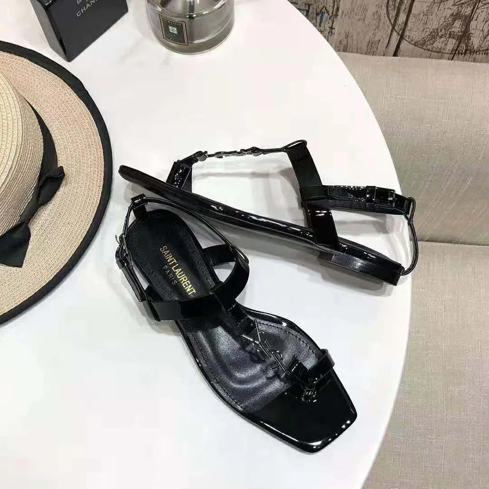 Saint Laurent YSL Cassandra Flat Sandals in Patent Leather with Silver for Women in Tone Monogram