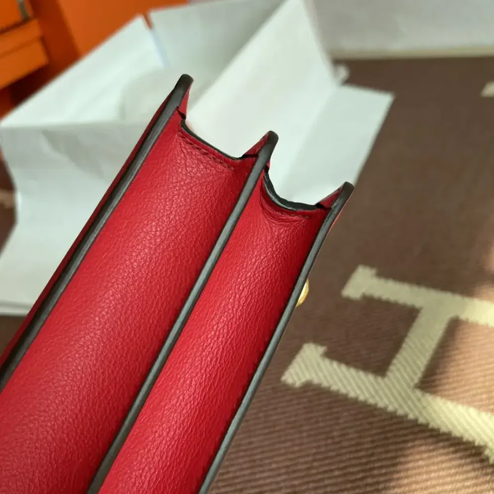 Hermes Roulis Mini Bag in Evercolor Calfskin for Women in Red/Gold