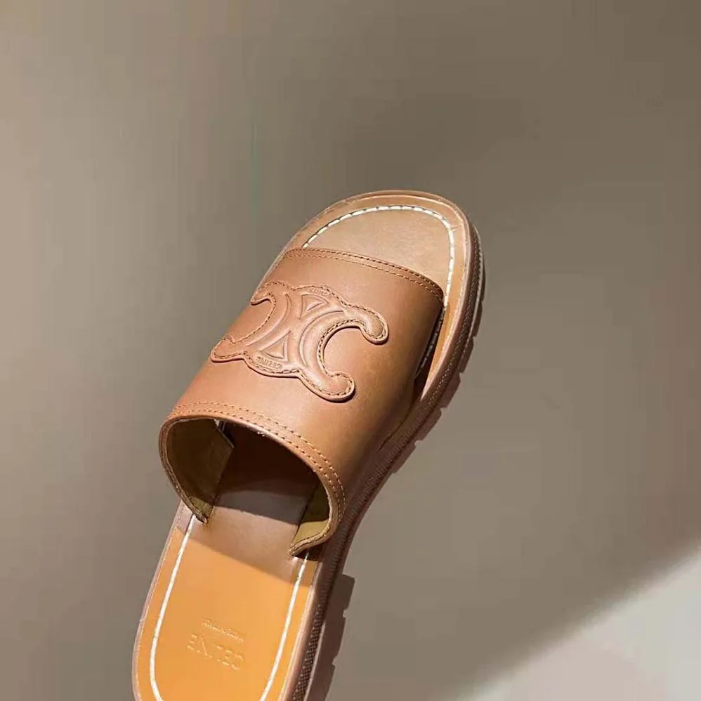 Celine Clea Triomphe Slide in Calfskin & Vegetal Tanning for Women Celine Clea Triomphe Slide in Calfskin & Vegetal Tanning for Women