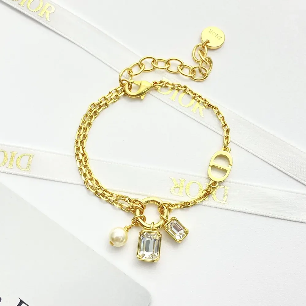 Dior Petit CD Bracelet Gold-Finish Metal with a White Resin Pearl and Silver for Women in Tone Crystals Dior Petit CD Bracelet Gold-Finish Metal with a White Resin Pearl and Silver for Women in Tone Crystals