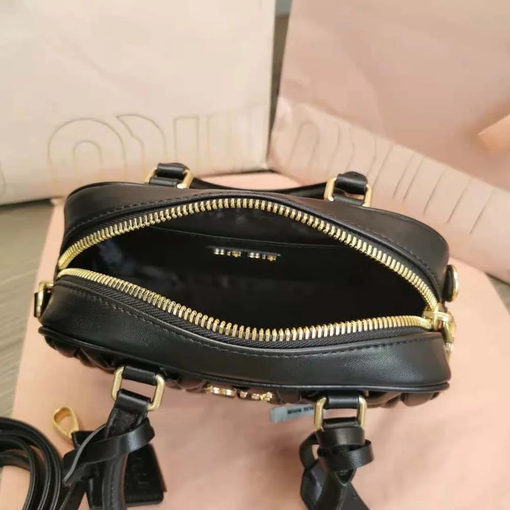 Miu Miu Matelassé Nappa Leather Top-Handle Bag for Women in Black