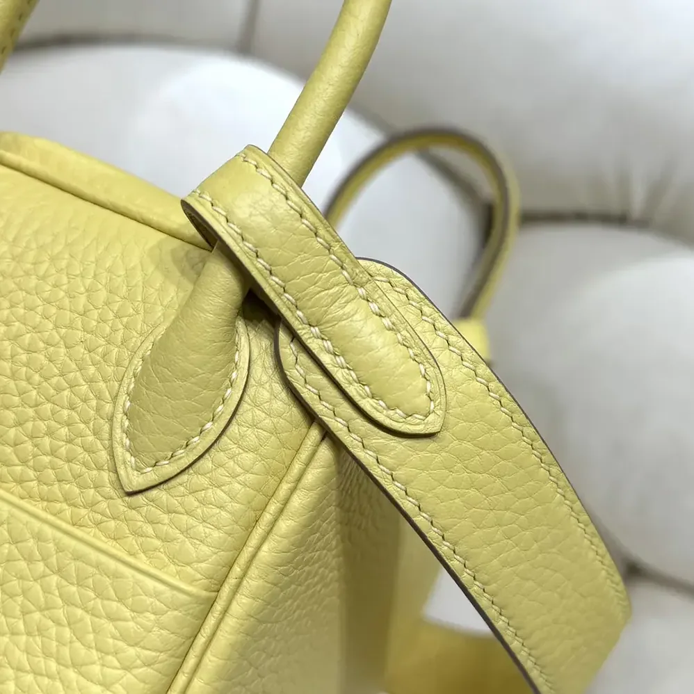 Hermes Lindy Mini 19 in Clemence Leather for Women in Yellow/Gold Hermes Lindy Mini 19 in Clemence Leather for Women in Yellow/Gold