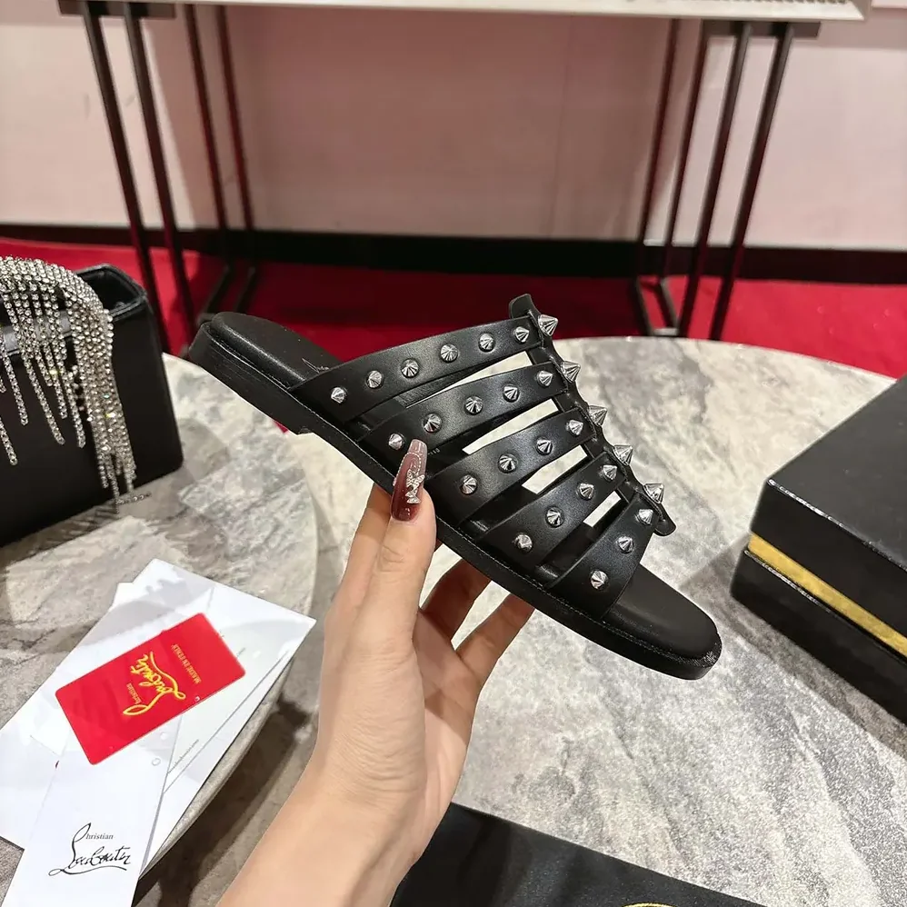 Christian Louboutin Charja Mules Waxed Calf Leather for Women in Black Christian Louboutin Charja Mules Waxed Calf Leather for Women in Black