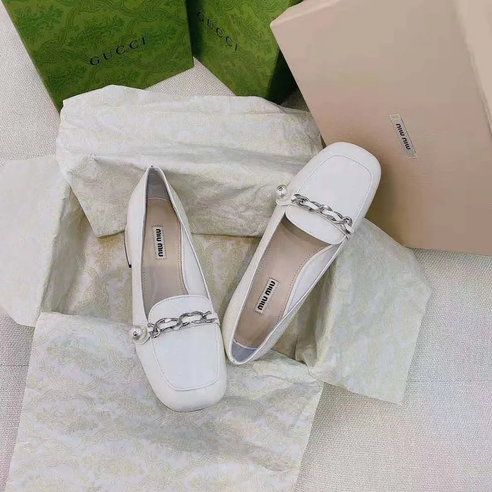 Miu Miu Patent Leather Loafers in 35mm Heel for Women in White Miu Miu Patent Leather Loafers in 35mm Heel for Women in White