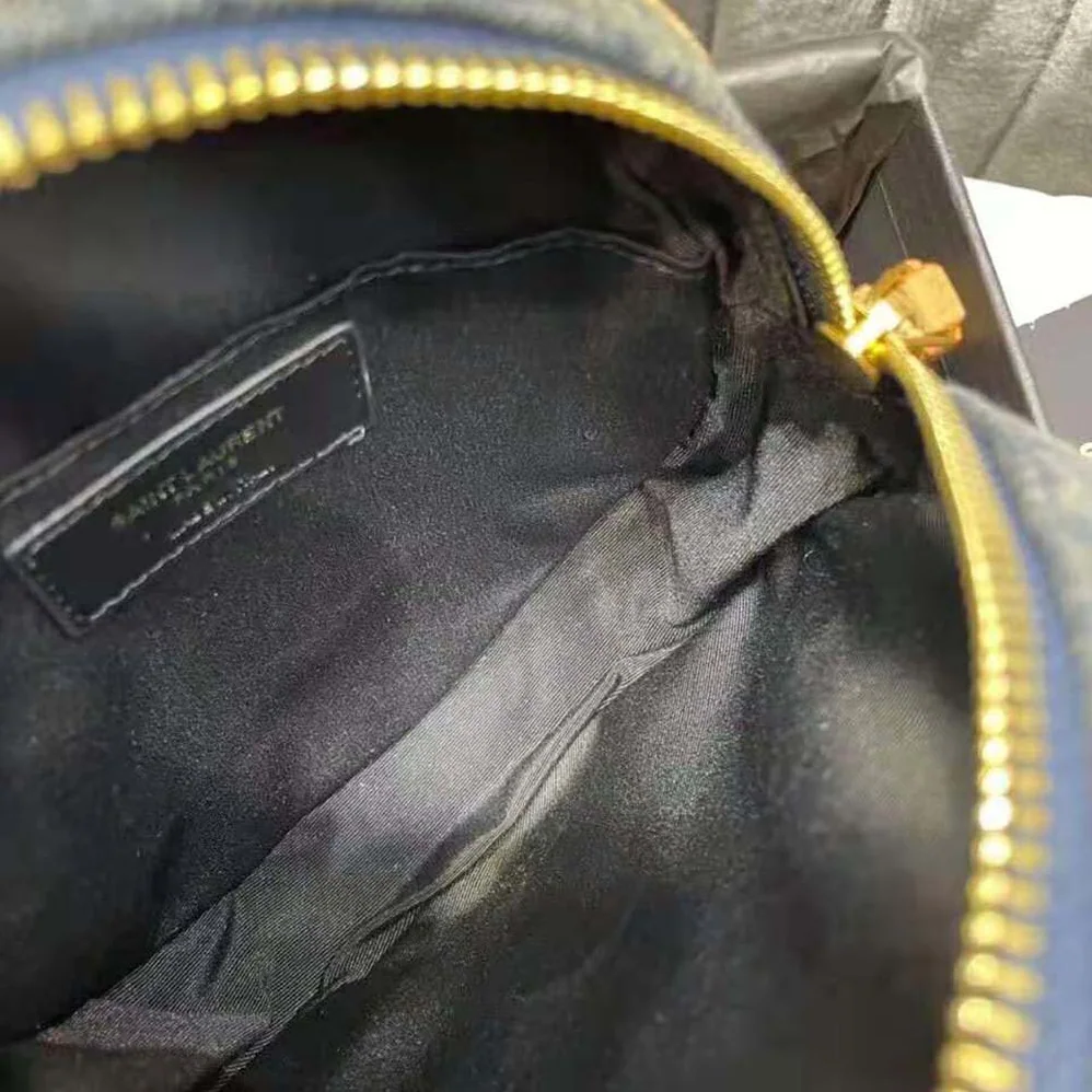 Saint Laurent YSL Vinyle Round Camera Bag in Chevron for Women in Quilted Denim and Suede Saint Laurent YSL Vinyle Round Camera Bag in Chevron for Women in Quilted Denim and Suede