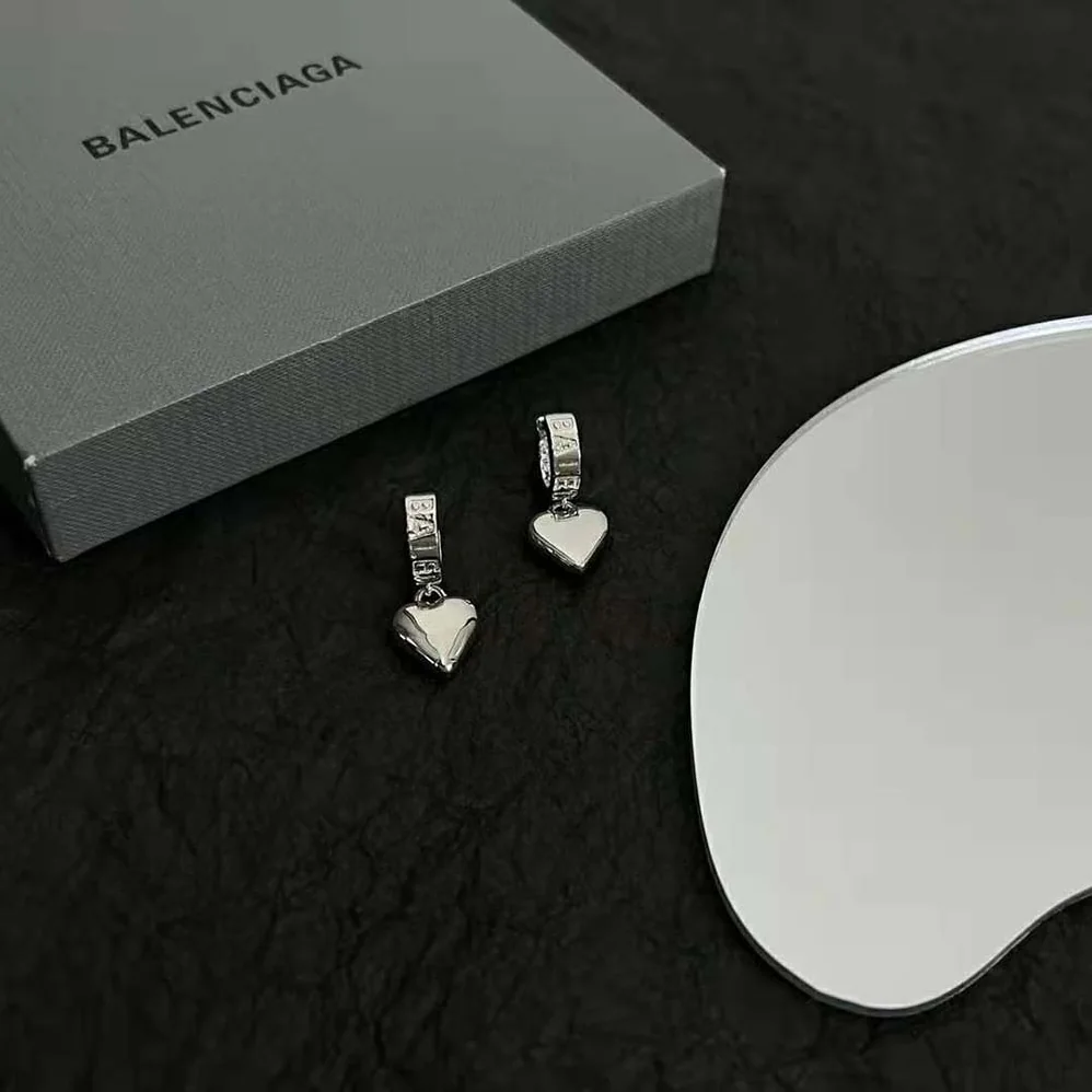 Balenciaga Sharp Heart Earrings in Silver for Women