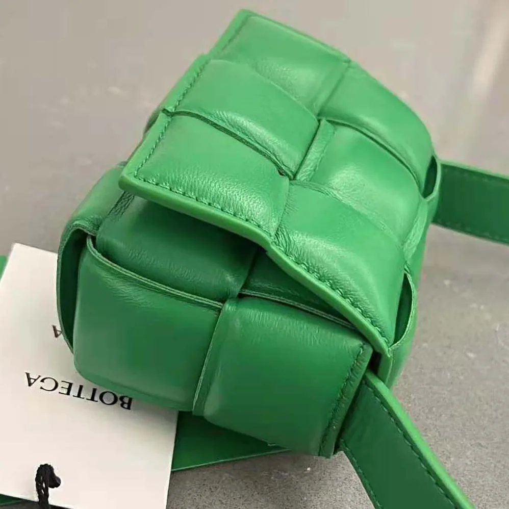 Bottega Veneta Candy Padded Cassette Mini Padded Intreccio Leather Cross-Body Bag for Women in Green Bottega Veneta Candy Padded Cassette Mini Padded Intreccio Leather Cross-Body Bag for Women in Green
