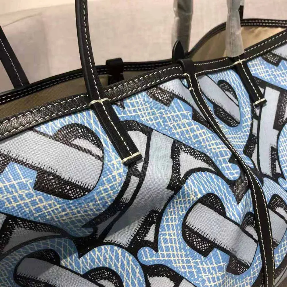 Burberry Mini Monogram Print E-canvas Beach Tote for Women in Blue Burberry Mini Monogram Print E-canvas Beach Tote for Women in Blue