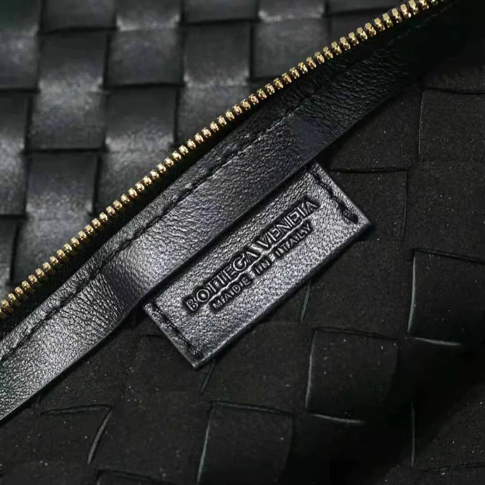 Bottega Veneta Turn Medium Intrecciato Leather Pouch with Adjustable Strap for Women in Black