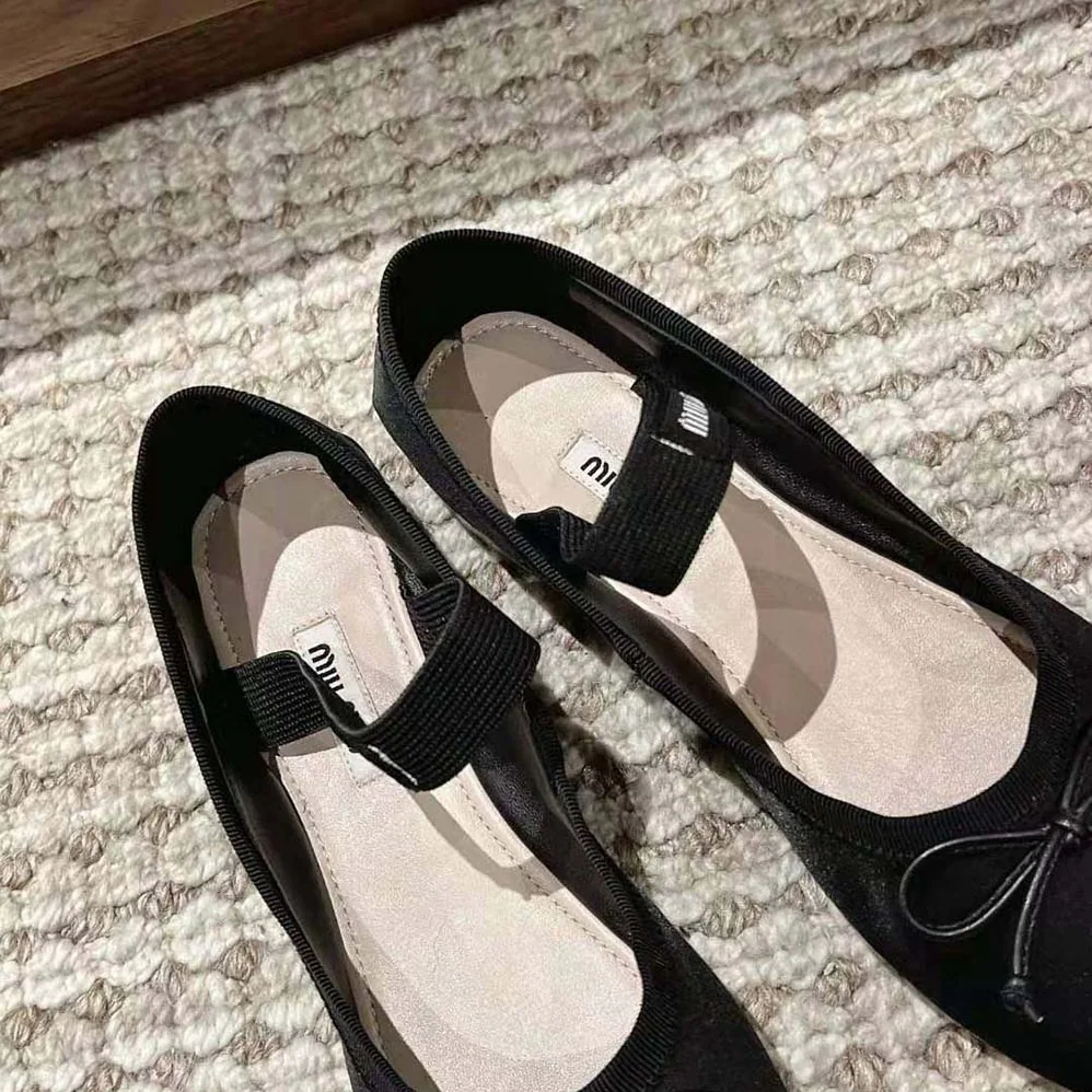 Miu Miu Satin Ballerinas with Knit Logo Label for Women in Black Miu Miu Satin Ballerinas with Knit Logo Label for Women in Black