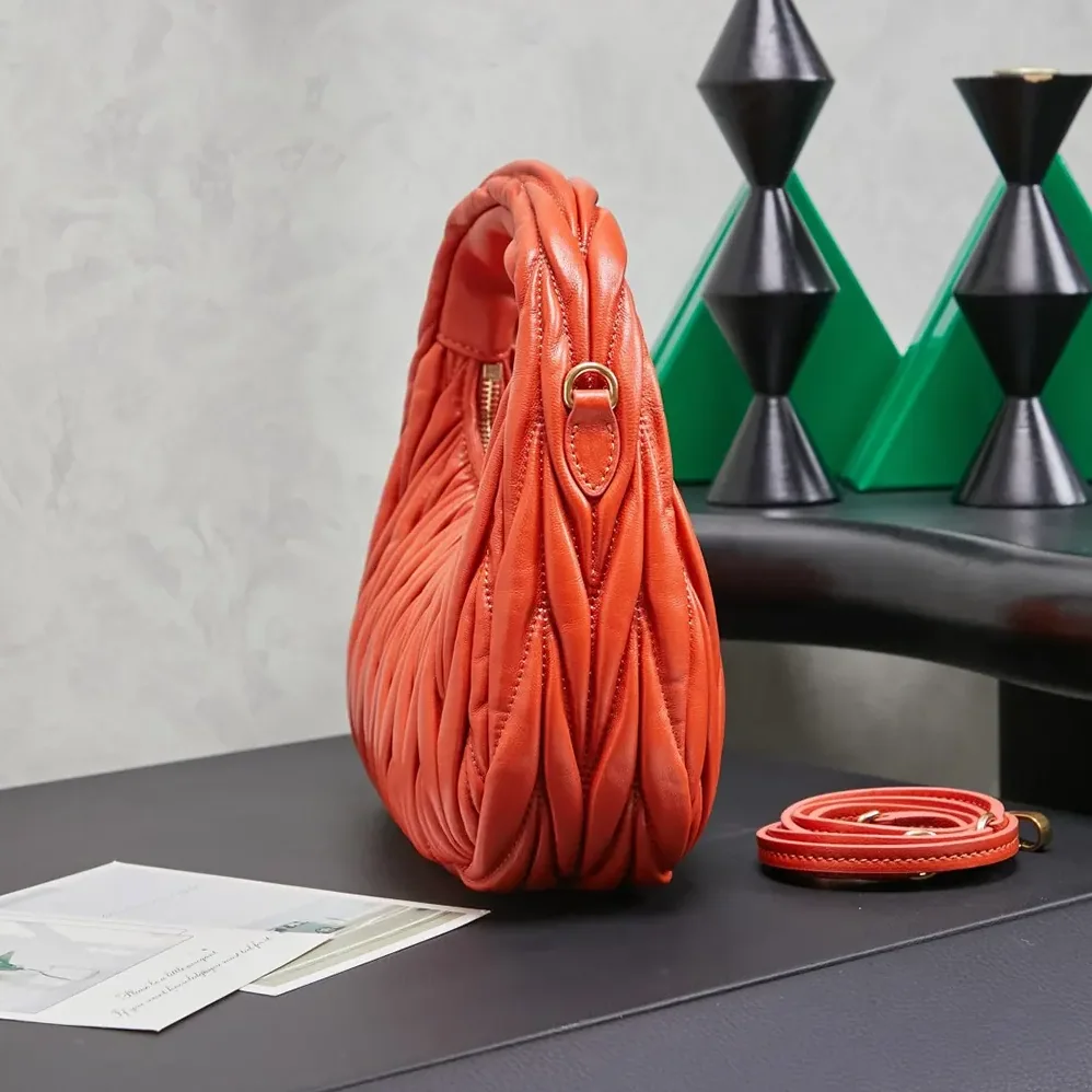 Miu Miu Wander Matelassé Nappa Leather Hobo Bag for Women in Orange Miu Miu Wander Matelassé Nappa Leather Hobo Bag for Women in Orange
