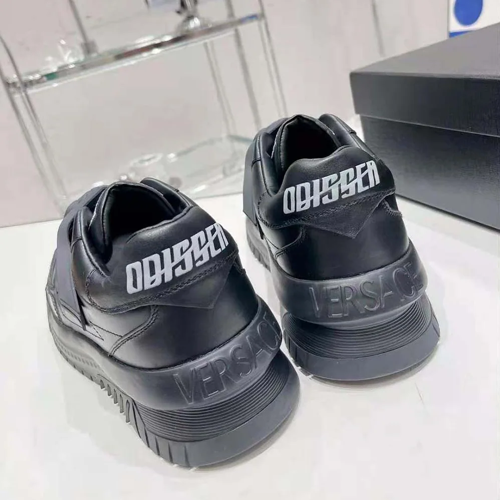 Versace Odissea Sneakers are Set on Rubber Soles with Perforated Toe Caps for Unisex in Black Versace Odissea Sneakers are Set on Rubber Soles with Perforated Toe Caps for Unisex in Black