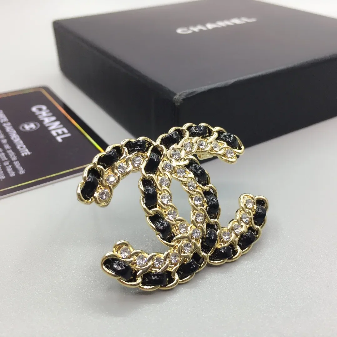Chanel Brooch CC Logo Gold in toned