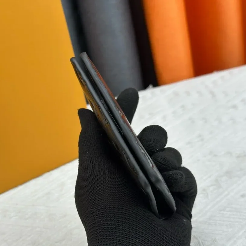 Louis Vuitton Pocket Organizer In Black Monogram Shadow Calfskin Louis Vuitton Pocket Organizer In Black Monogram Shadow Calfskin