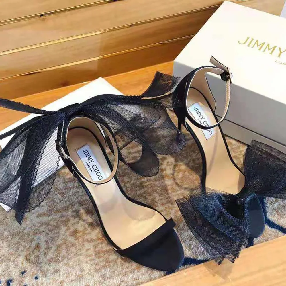 Jimmy Choo Aveline 100 Black Sandals with Asymmetric Grosgrain Mesh Fascinator Bows for Women Jimmy Choo Aveline 100 Black Sandals with Asymmetric Grosgrain Mesh Fascinator Bows for Women