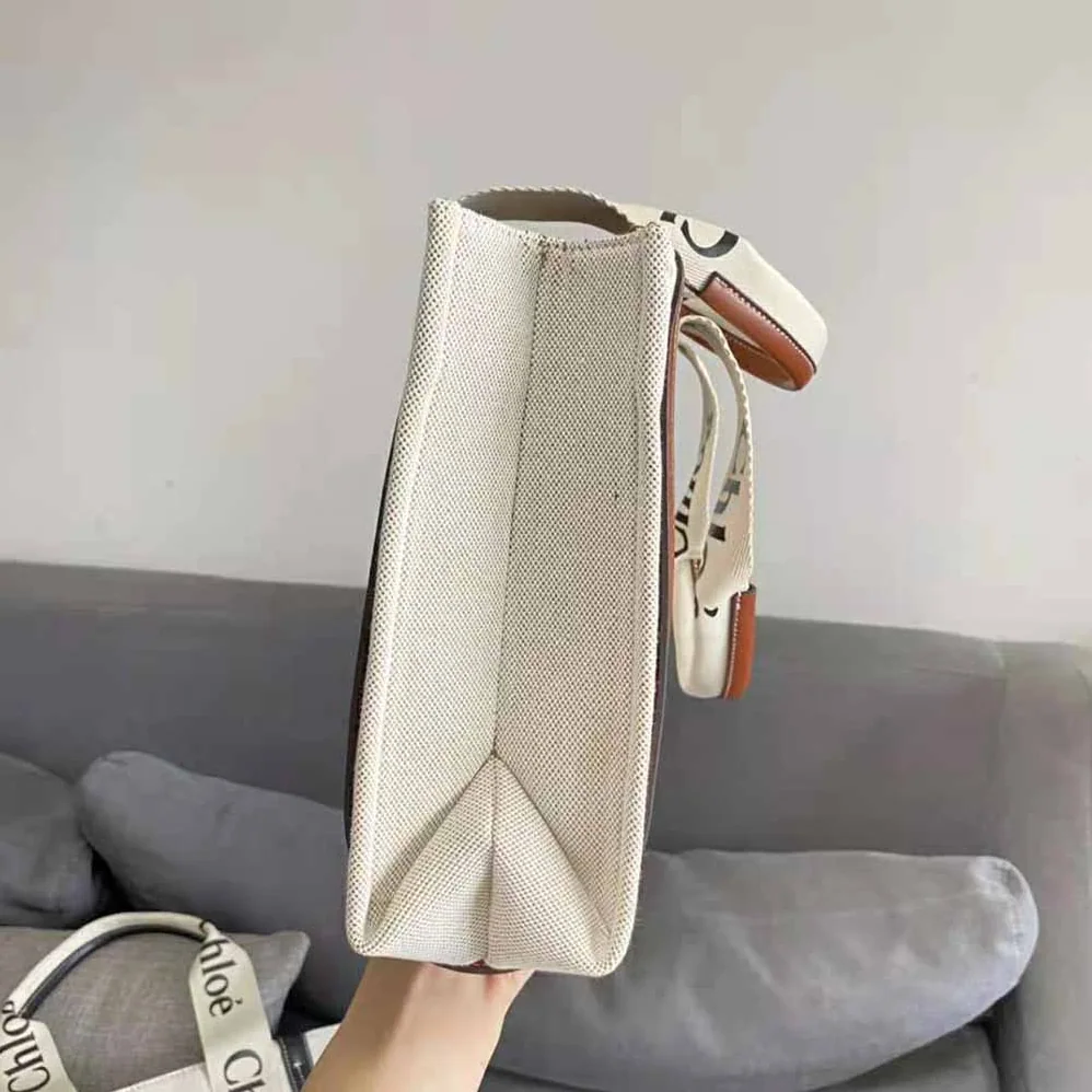Chloe Large Woody Tote Bag in Linen Canvas and Shiny Calfskin with Woody Ribbon for Women Chloe Large Woody Tote Bag in Linen Canvas and Shiny Calfskin with Woody Ribbon for Women