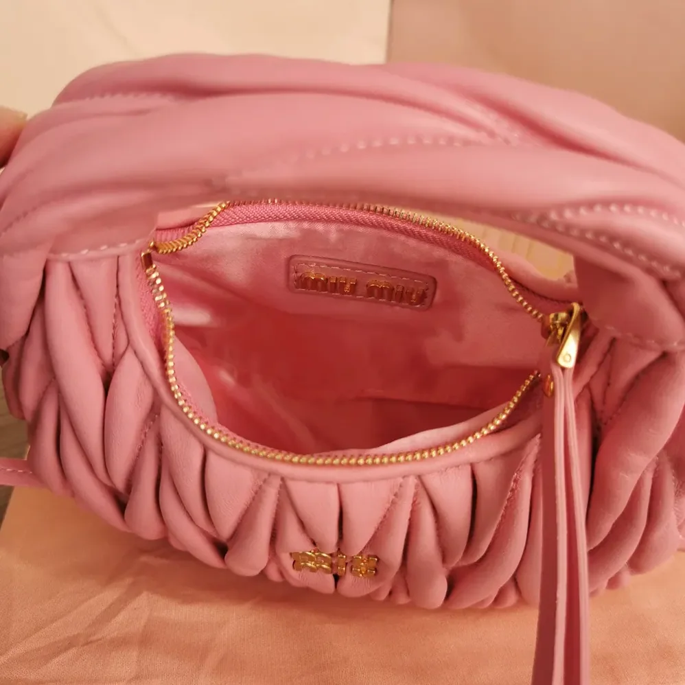 Miu Miu Wander Matelassé Nappa Leather Hobo Mini-Bag for Women in Pink