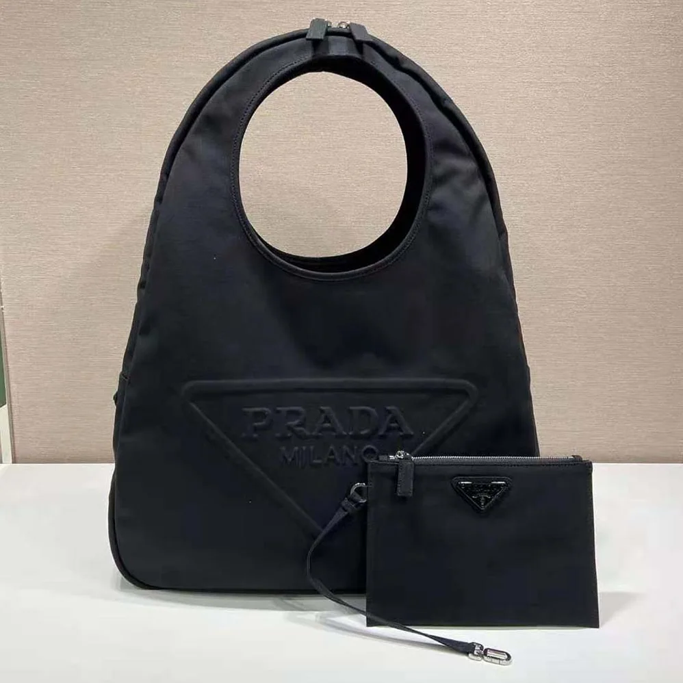Prada Canvas Hobo Bag with Embossed Logo on the Front for Men in Black Prada Canvas Hobo Bag with Embossed Logo on the Front for Men in Black