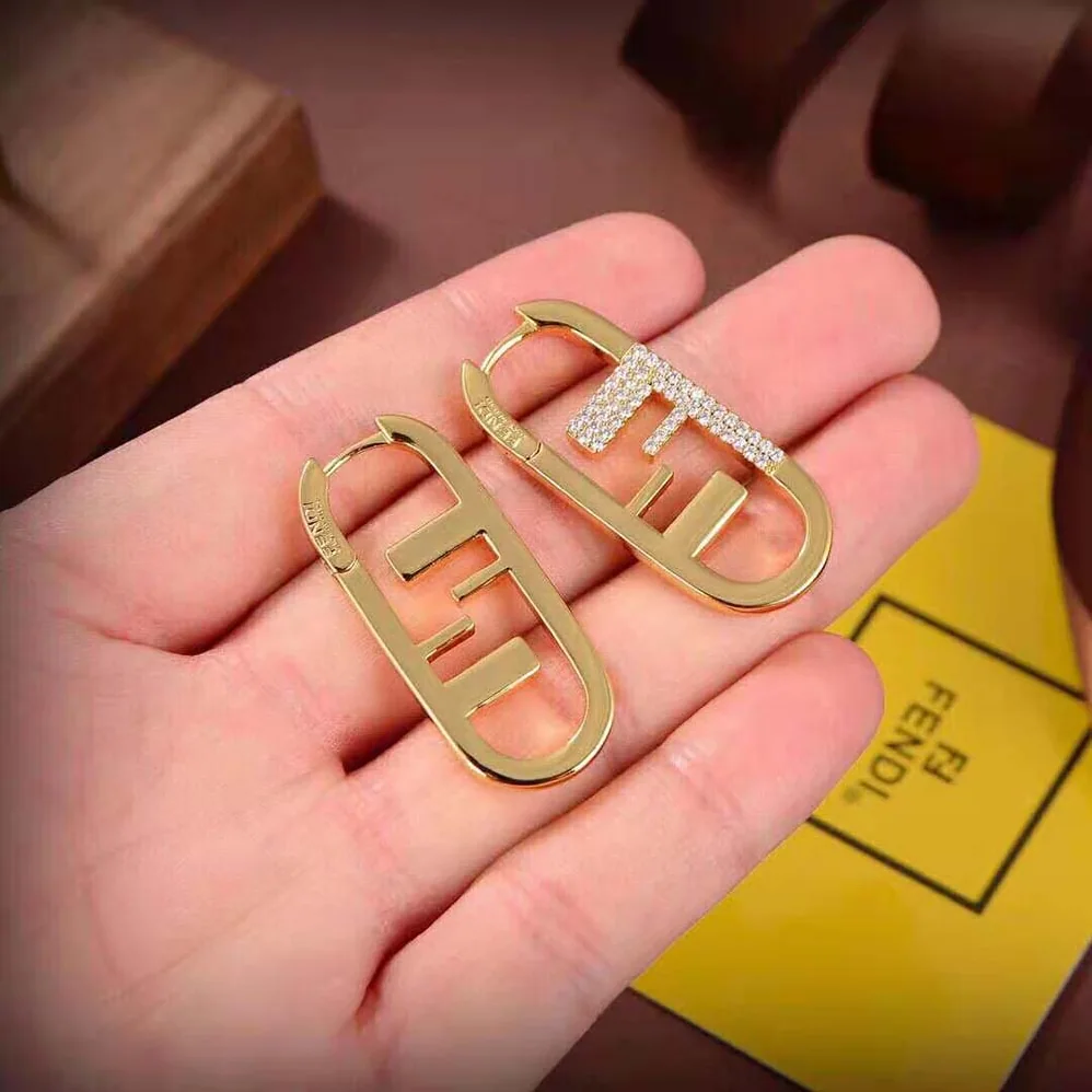 Fendi O'Lock Earrings Gold for Women in colored