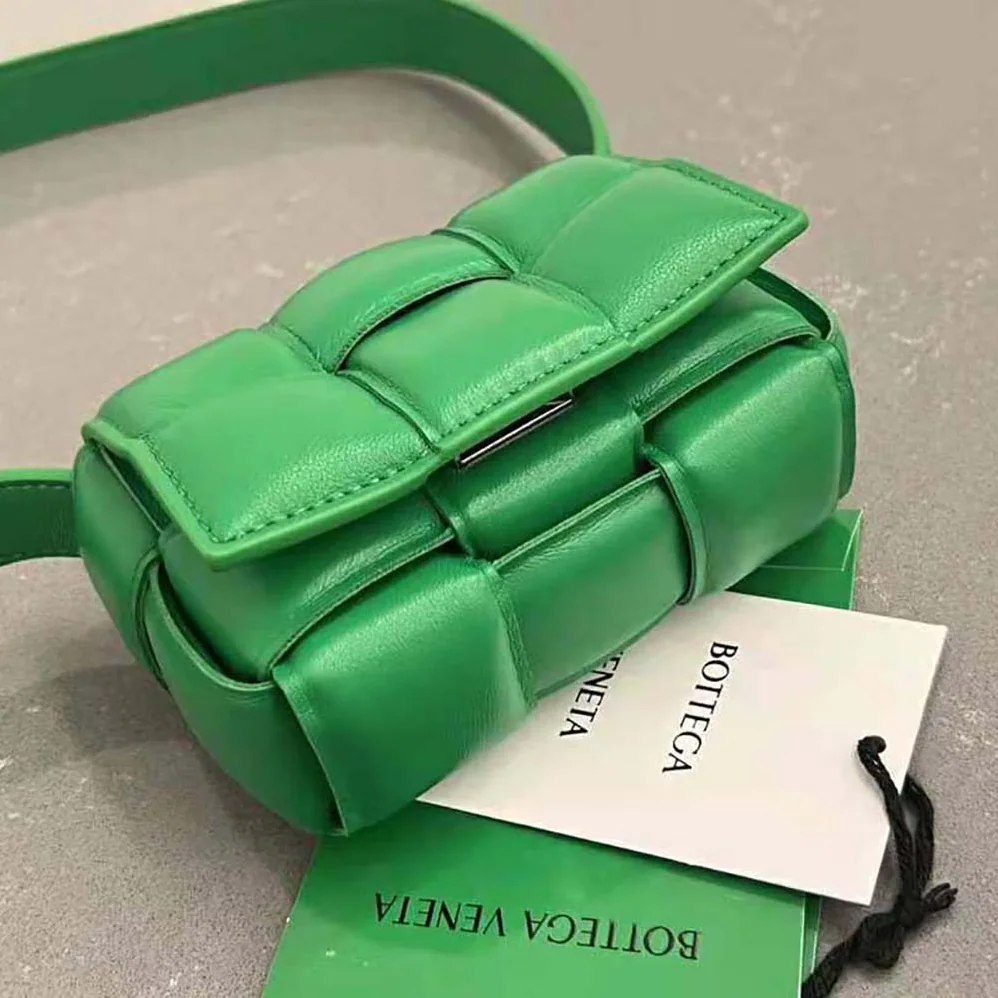 Bottega Veneta Candy Padded Cassette Mini Padded Intreccio Leather Cross-Body Bag for Women in Green Bottega Veneta Candy Padded Cassette Mini Padded Intreccio Leather Cross-Body Bag for Women in Green
