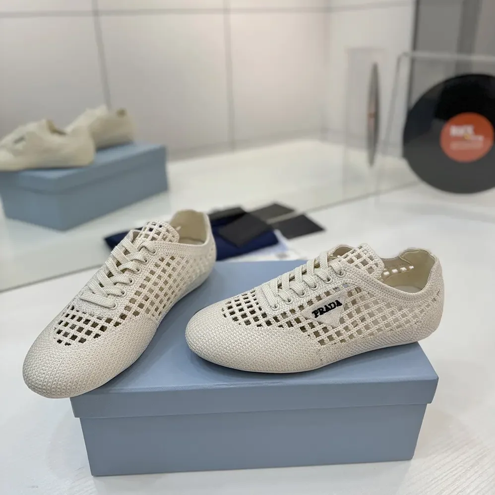Prada Collapse Crochet Laced Sneakers for Unisex in White Prada Collapse Crochet Laced Sneakers for Unisex in White